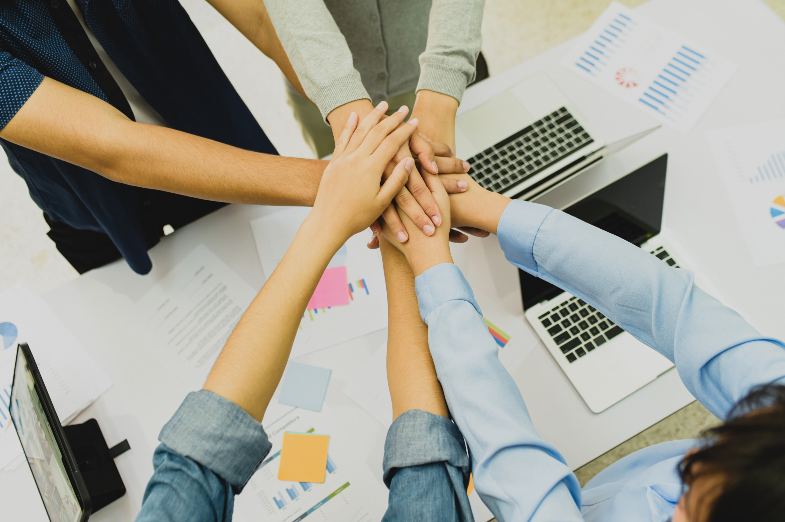 Teamwork group join hands.